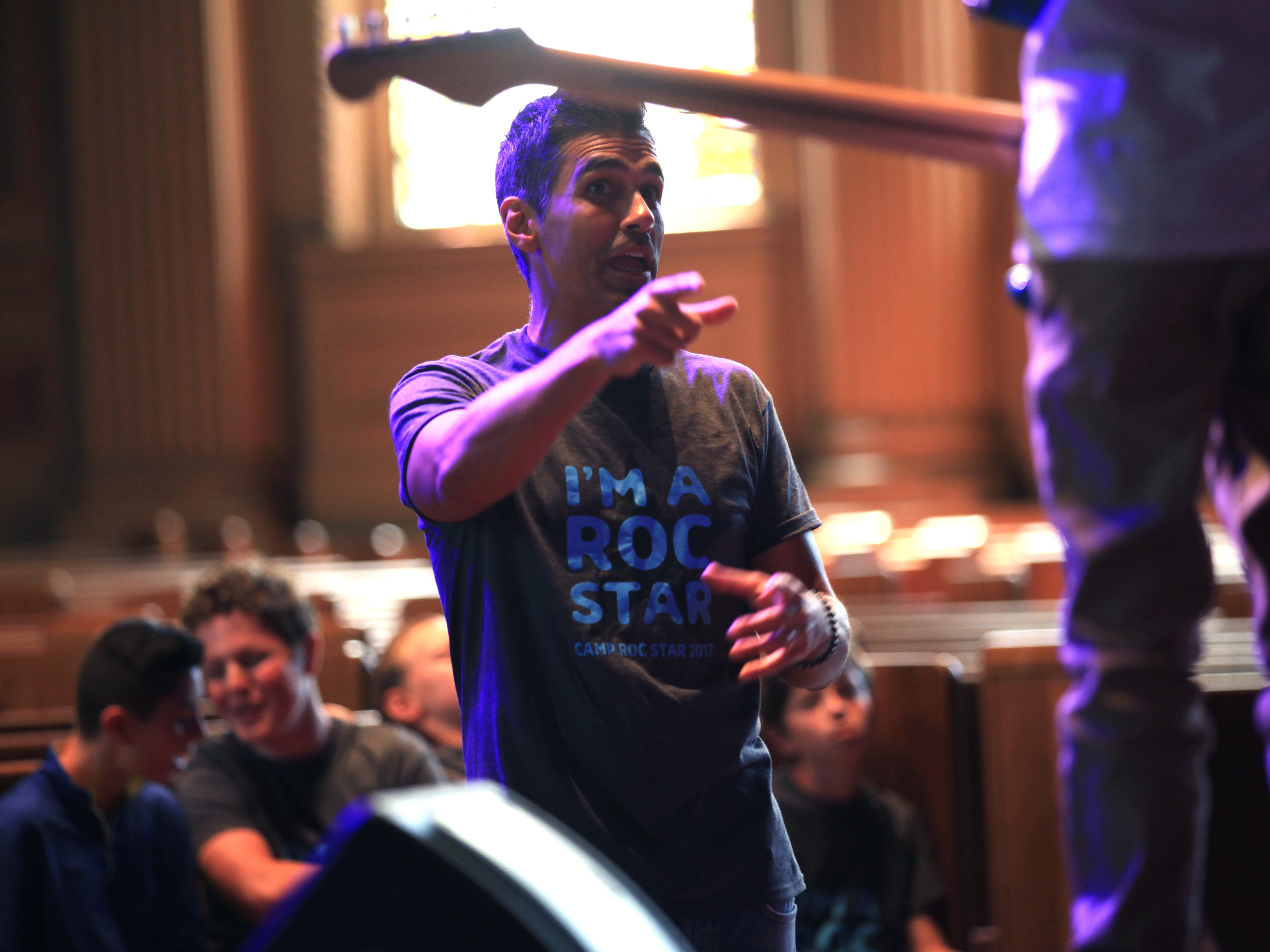 While musicians perform at Camp Rock Star, many of the staff, including Elvio Fernandes, coach the campers while they play. Fernandes is a musical artist with the band Daughtry.