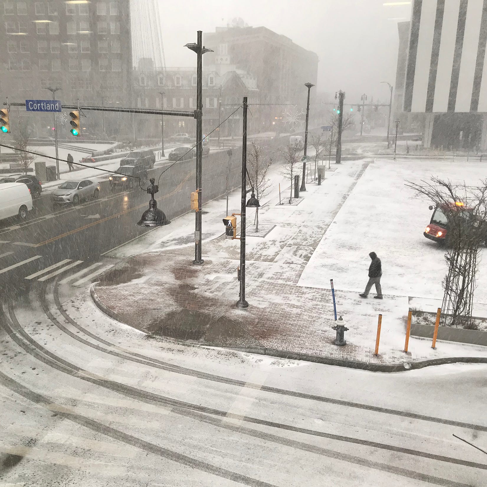 Snow squalls hit downtown Rochester.