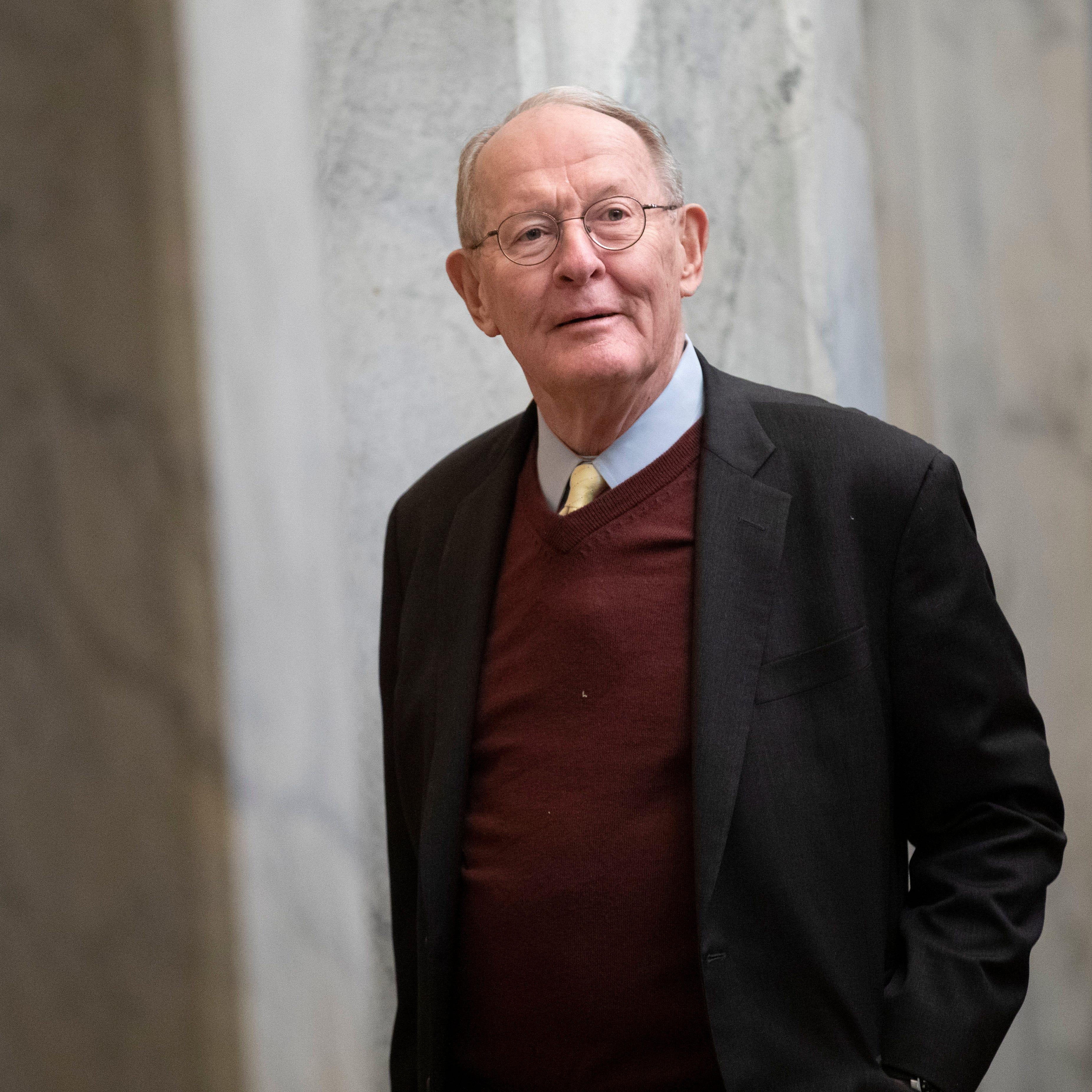 Sen. Lamar Alexander, R-Tenn., arrives on Capitol Hill in Washington, Thursday, Jan. 30, 2020, before the impeachment trial of President Donald Trump on charges of abuse of power and obstruction of Congress.