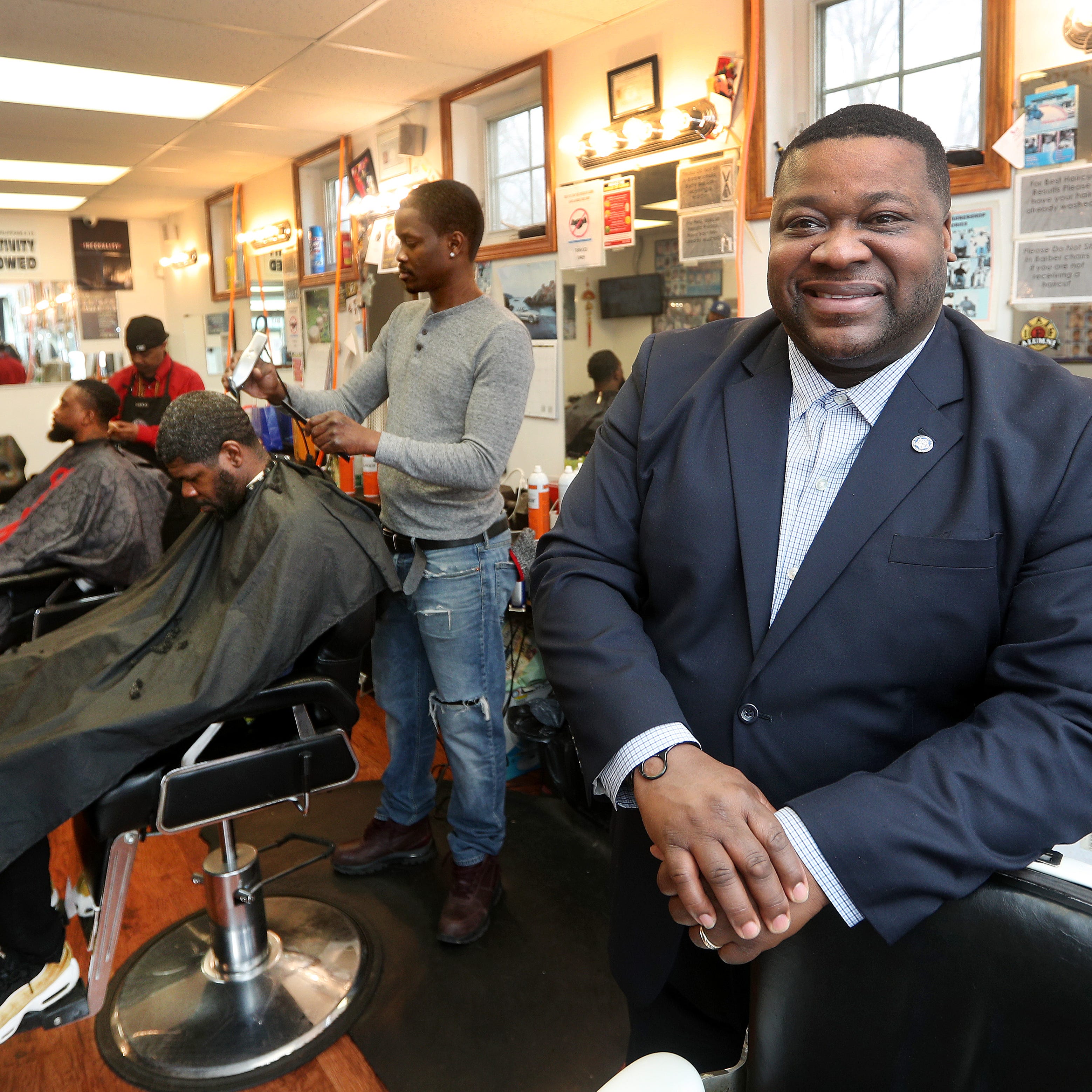 Willie Lightfoot in his Jefferson Avenue barber shop is one of the small businesses dealing with coronavirus. 