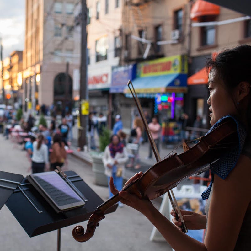 A violinist performs on a Yellow Barn Music Haul visit to New York City.