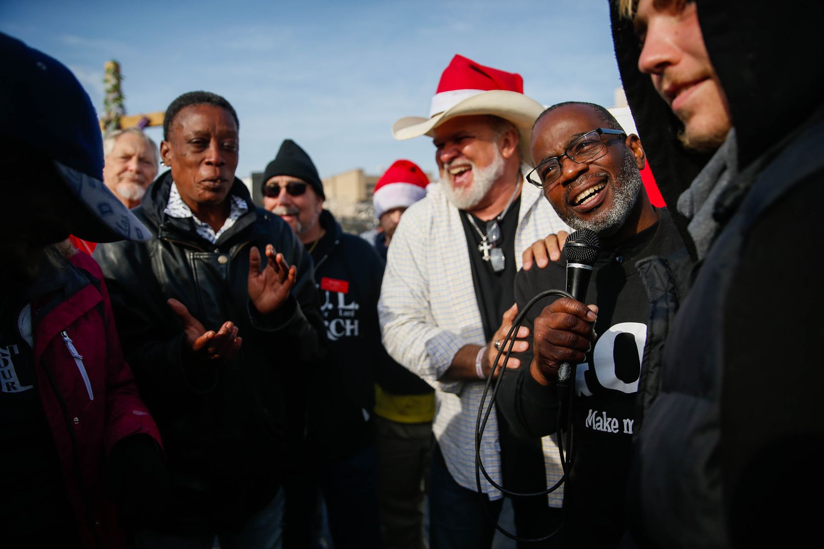 Pastor Leon Birdd (third from right) and Pastor Jeffery Parker (second from right) welcomed new members to S.O.U.L. Church on Dec. 8, 2019.