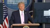 Donald Trump wearing a suit and tie: President Donald Trump fires back angrily at his predecessor Barack Obama after being branded an unserious president who had put US democracy in danger. Trump tells reporters Obama was an "ineffective" and "terrible" leader. SOUNDBITE