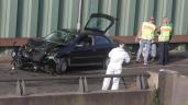 a man standing in front of a car: Images show the scene after a man caused a series of motorway accidents in Berlin, injuring six people including three seriously in what German prosecutors described as an Islamist act. Local media reported that the man was a 30-year-old Iraqi who had shouted "Allahu Akbar" (God is Greatest) when getting out of his car after hitting several vehicles around 6:30 pm (1630 GMT) on Tuesday 18 August 2020. Berlin police said the man caused three accidents on the Autobahn 100 in the city's Tempelhof-Schoeneberg district. IMAGES