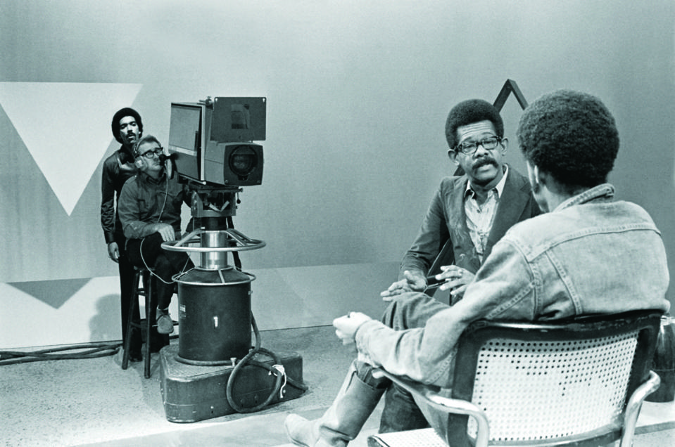 (L to R) SOUL! director Stan Latham stands with cameraman on set for the interview between Host/Producer of the TV show SOUL! Ellis Haizlip with filmmaker Melvin Van Peebles (Sweet Sweetback’s Baaddass Song) in a scene from the film Mr. SOUL! DIRECTED BY MELISSA HAIZLIP. 