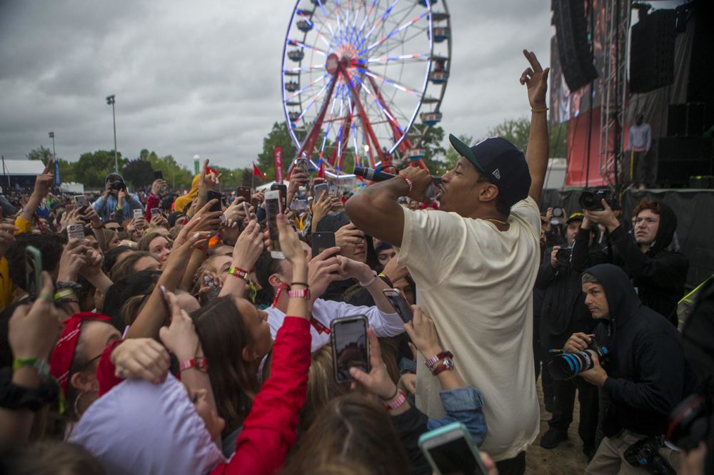 Boston artist Cousin Stizz greets the crowd during his 2018 performance at Boston Calling. (Jesse Costa/WBUR)